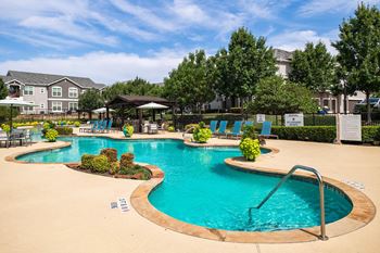 150 Foot expansive, resort style swimming pool with lounge deck